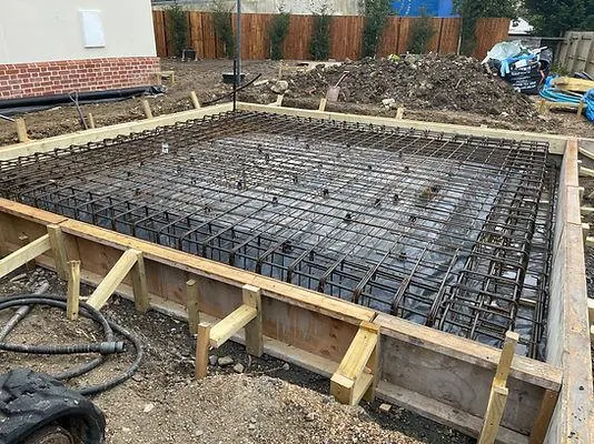 Raft or mat foundation for a building